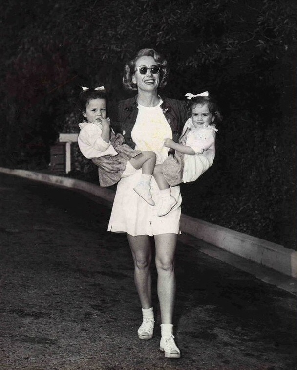 1949. With twins Cathy and Cynthia.