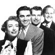 1950. Publicity for 'The Damned Don't Cry.' From left: Joan, Steve Cochran, Richard Egan, David Brian.