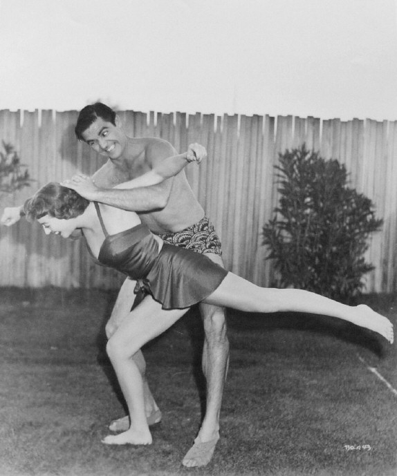 1950. Publicity for 'The Damned Don't Cry' with Steve Cochran.