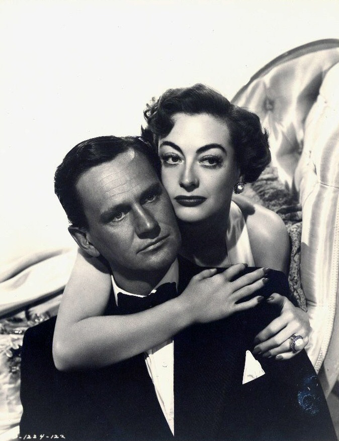 1950. 'Harriet Craig' publicity with Wendell Corey, shot by Robert Coburn.