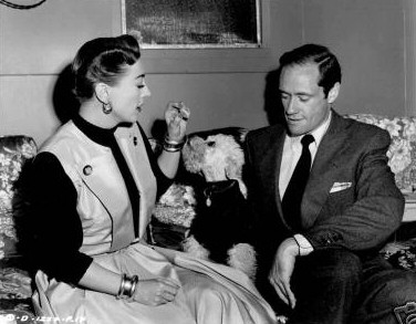 1950. On the 'Harriet Craig' set with Mel Ferrer and poodle Cliquot.