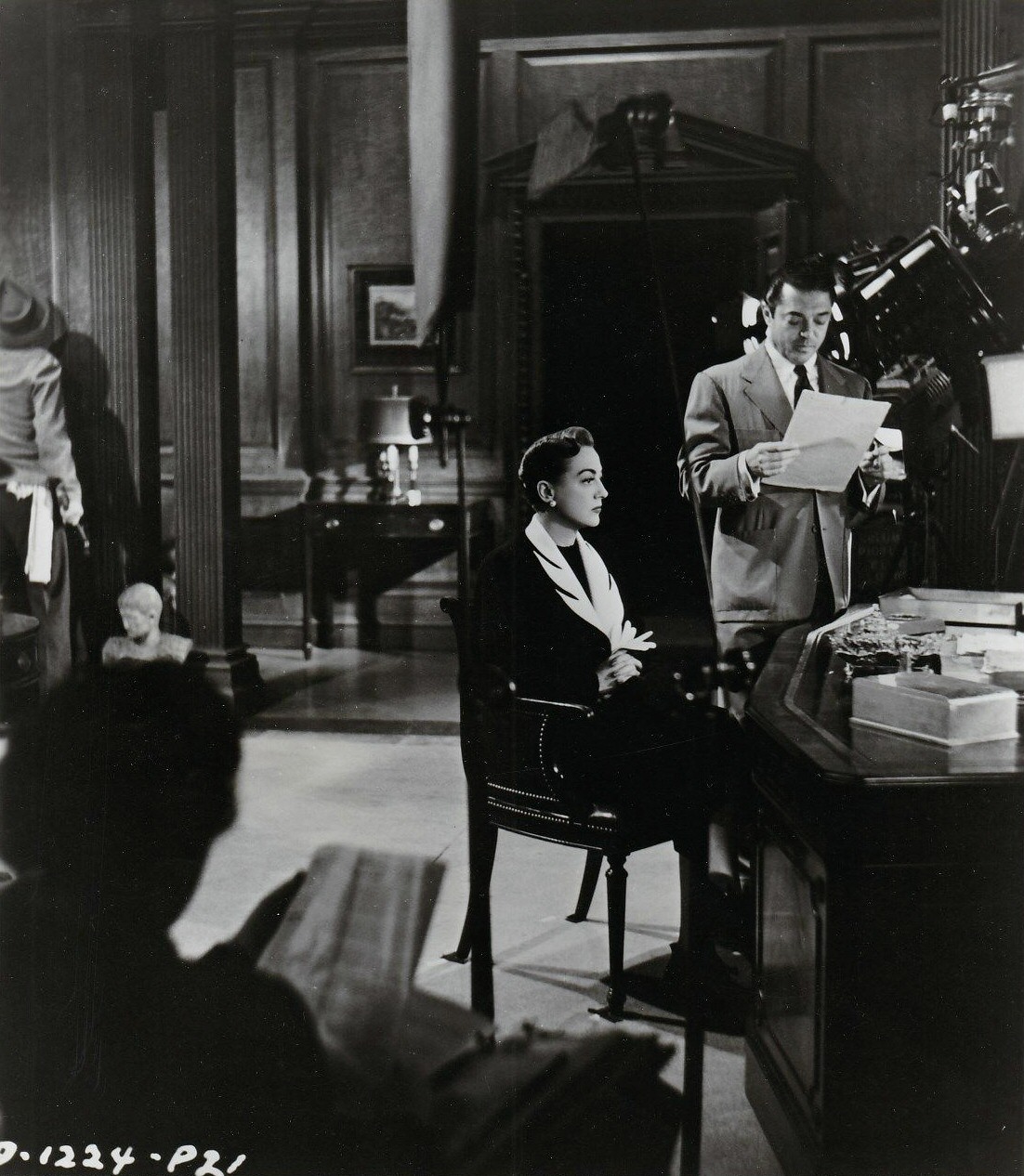 1950. On the set of 'Harriet Craig' with director Vince Sherman.