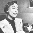 1950. On the set of 'Harriet Craig.'