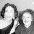 Circa 1952, with Edith Piaf.