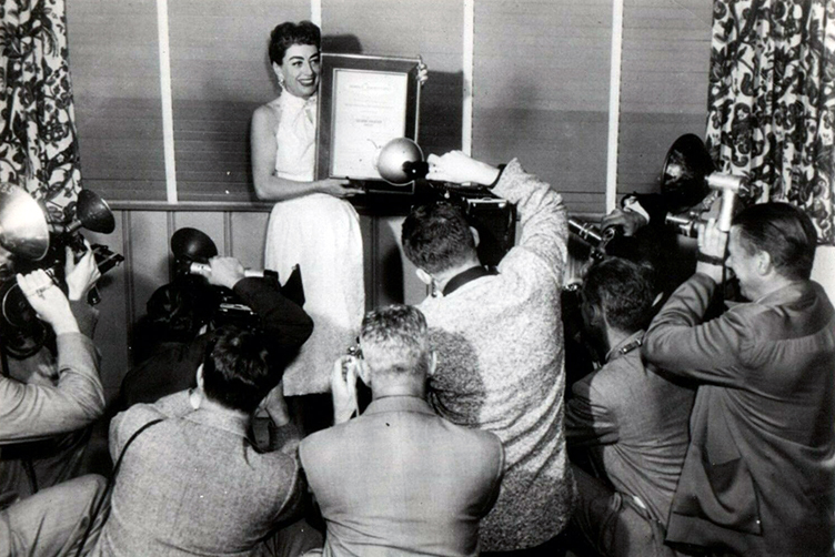 1955. Receiving the Golden Shutter Award from the LA Press Photographers Assoc.