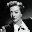 1950. Publicity for 'Damned Don't Cry' by Bert Six.