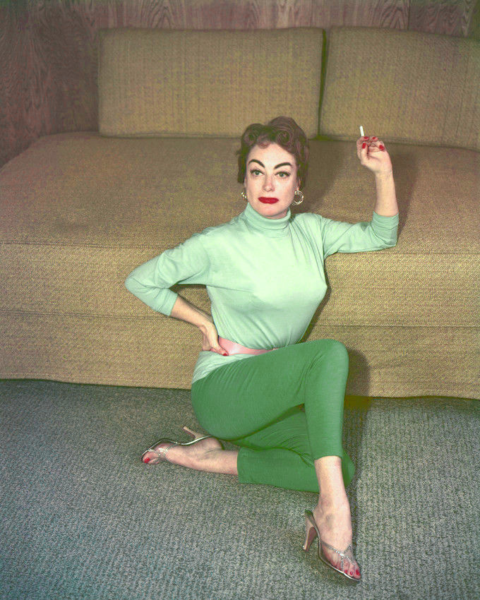 1955. On the set of 'Female on the Beach.'