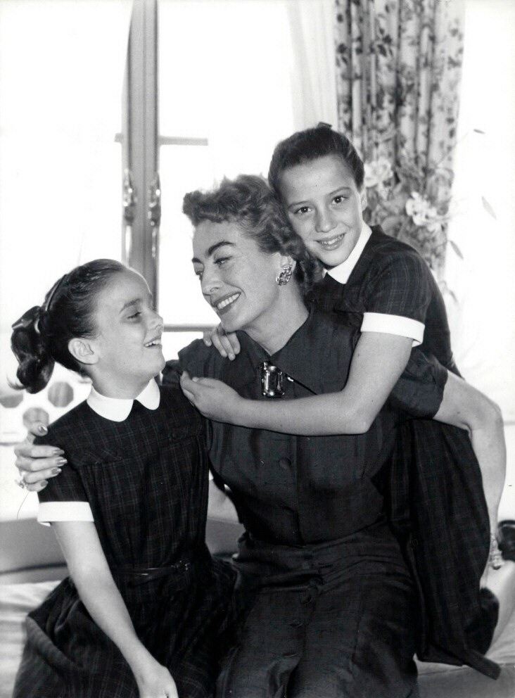 1956 in London with twins Cathy and Cindy.