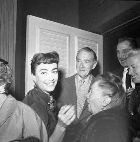 1954. With Clifton Webb (and Vincent Price in doorway).