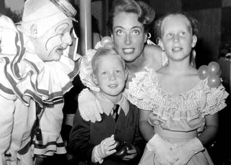 December 1947 at a Beverly Hills toy store opening with Christopher and Christina.