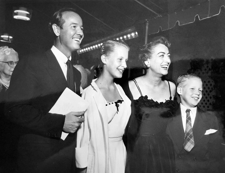 1951. With Earl Blackwell, Christina, and Christopher.