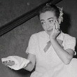 August 7, 1952. Joan recuperates after shaking hundreds of hands at the 'Sudden Fear' premiere.