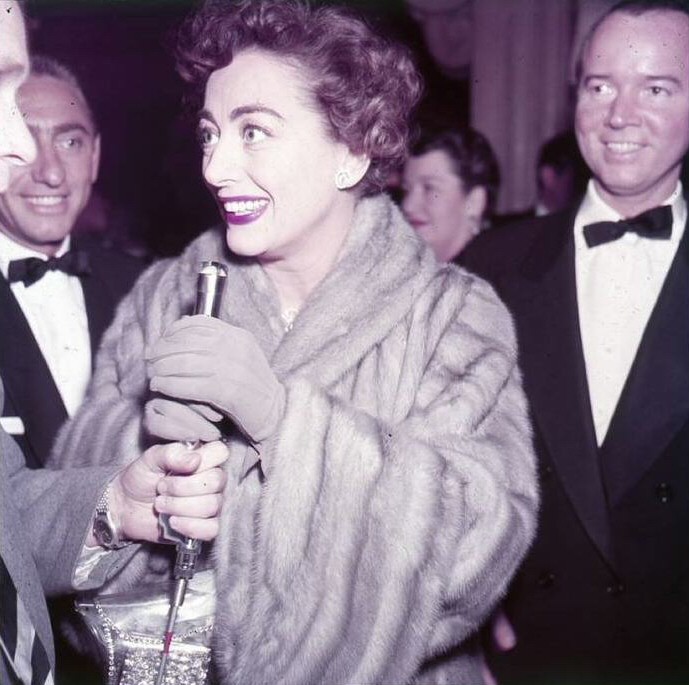 March 19, 1953, at the Pantages Theatre for the first televised Oscars. Director David Miller in background at left. (Thanks to Shane.)