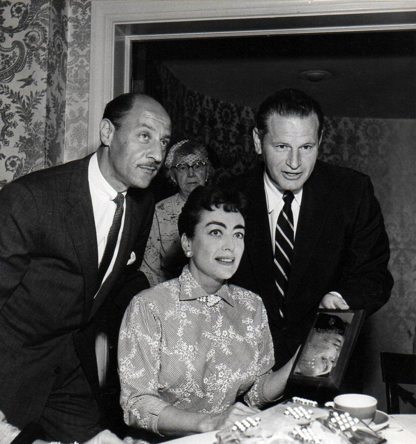 1954. Receiving an unknown award in Los Angeles.