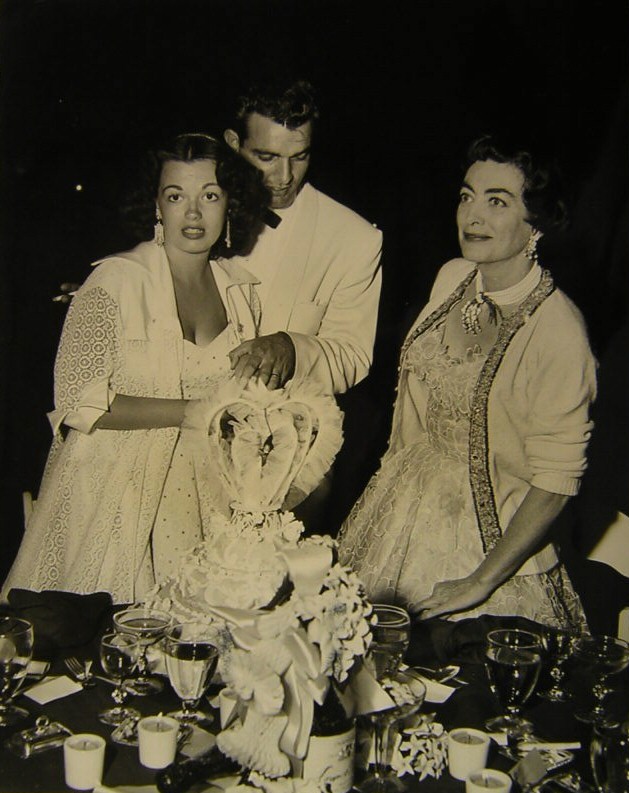 1953. Celebrating the 1-year anniversary of goddaughter Joan Evans and Kirby Weatherly.