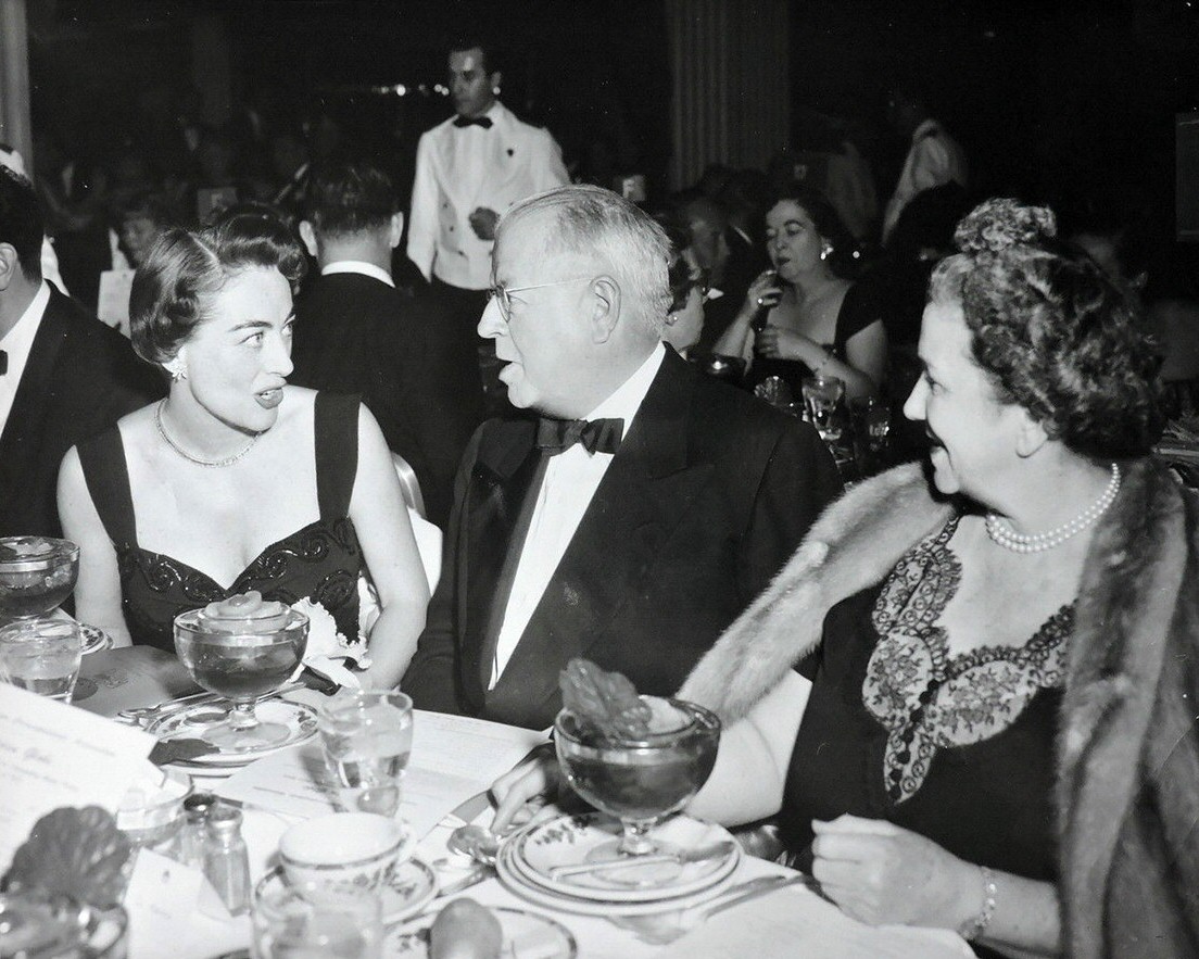 March 1953. At an awards dinner with Paramount head Frank Freeman and wife.