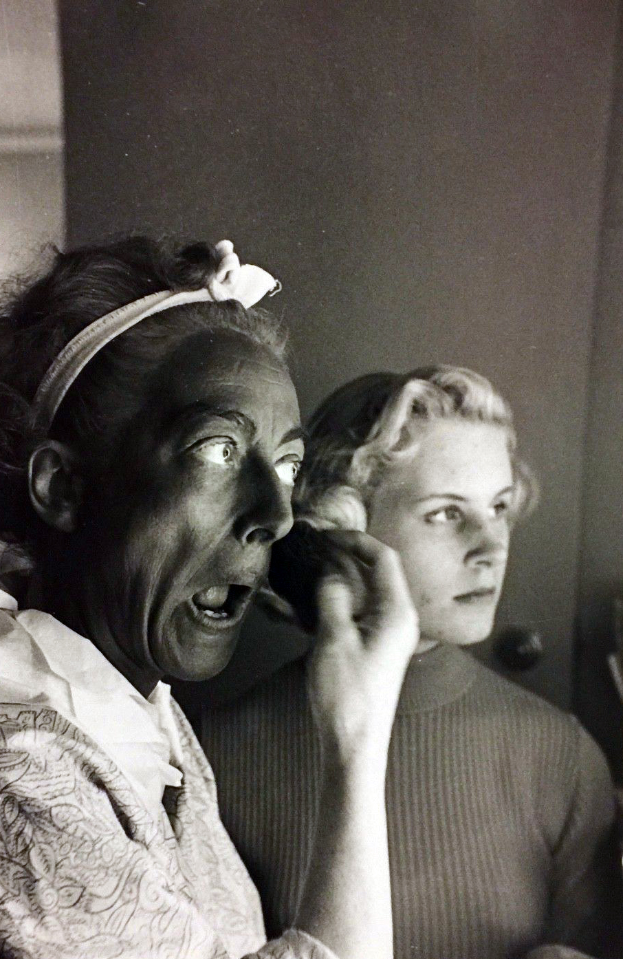 1953. Applying blackface on the set of 'Torch Song.' With Christina. (Shot by Sanford Roth.)