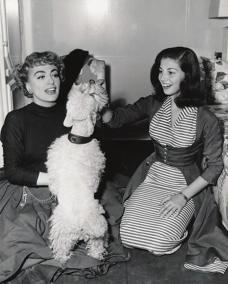 1953. On the set of 'Torch Song' with Pier Angeli and Cliquot.