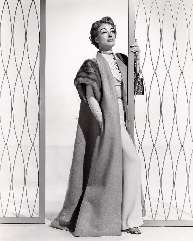 1953. 'Torch Song' publicity, with costume design by Helen Rose.