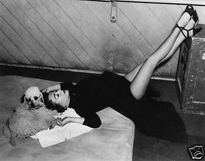 1953. On the set of 'Torch Song' with Cliquot.