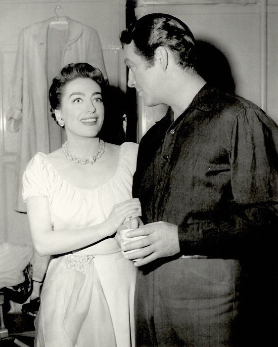 On the set of 'All the Brothers Were Valiant,' with Robert Taylor.