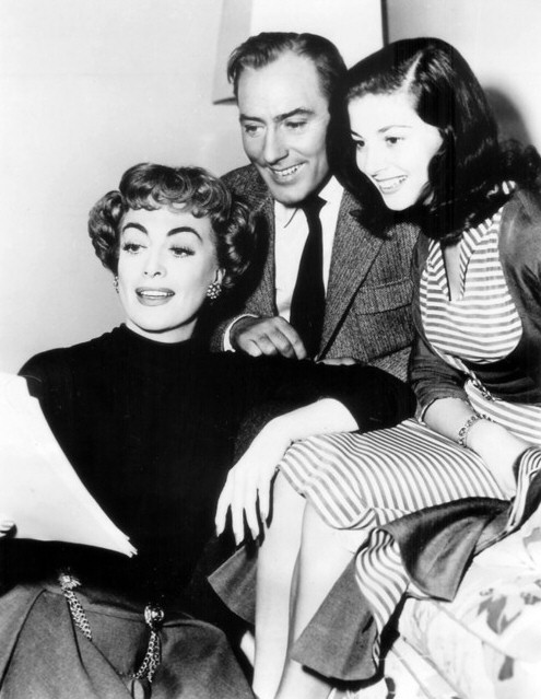 1953. On the set of 'Torch Song.' With Michael Wilding and Pier Angeli.