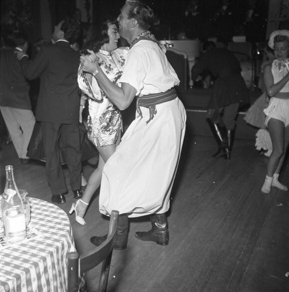 1954. With Cesar Romero at the Press Photographers' Ball.