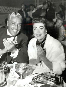 1954. At Ciro's with Cesar Romero.