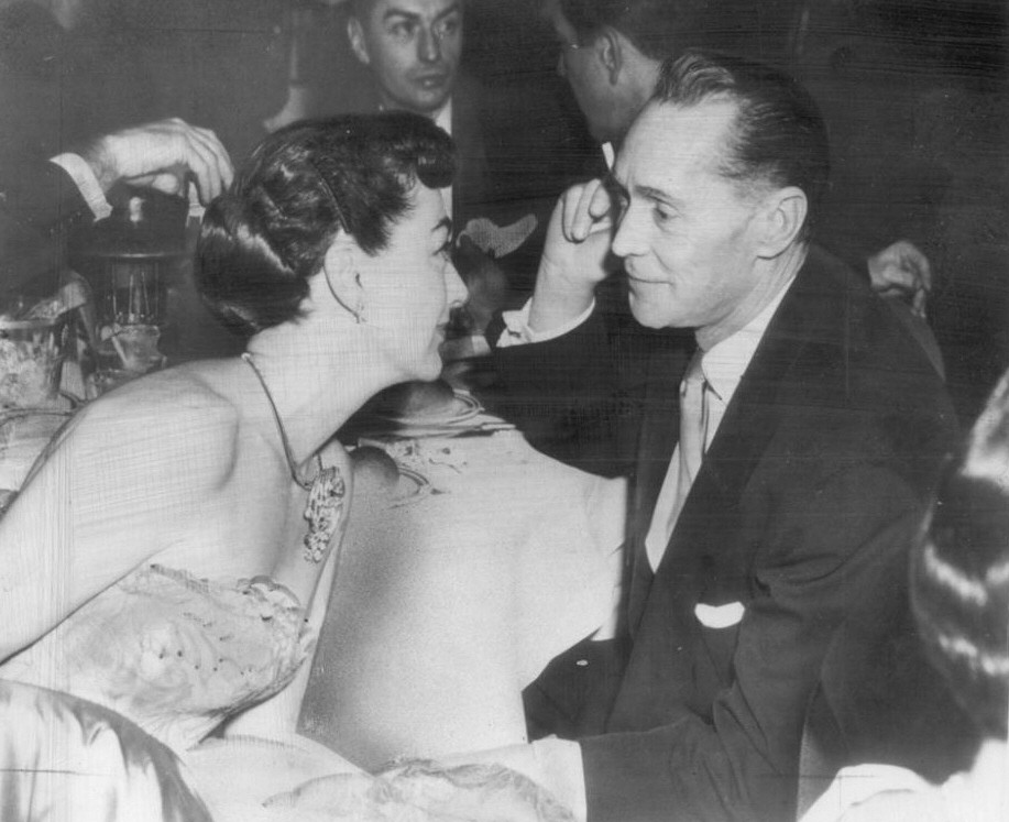 1954. With ex-husband Franchot Tone.