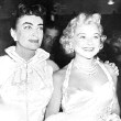 August 1954. At the premiere of 'The Egyptian,' with Sonja Henie and George Reeves.