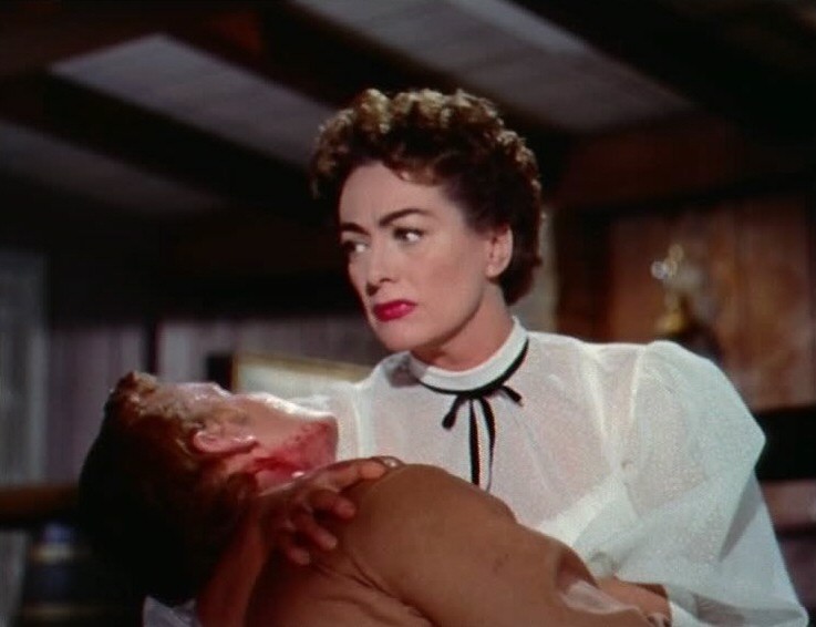 1954. A screen shot from 'Johnny Guitar' with Ben Cooper.