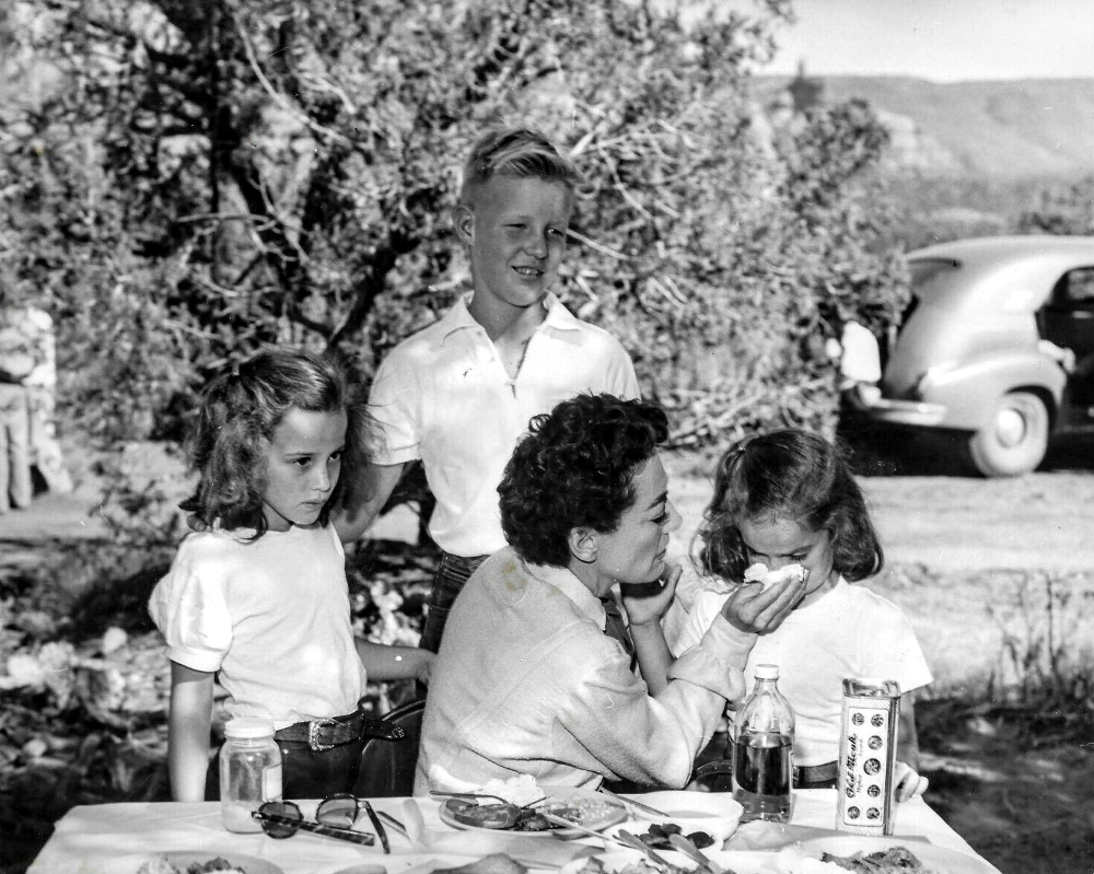 1954. On the set of 'Johnny Guitar' with Christopher and The Twins.