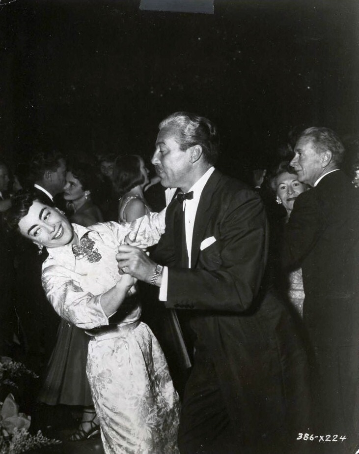 At the 9/29/54 premiere of 'The Star Is Born' with Cesar Romero.
