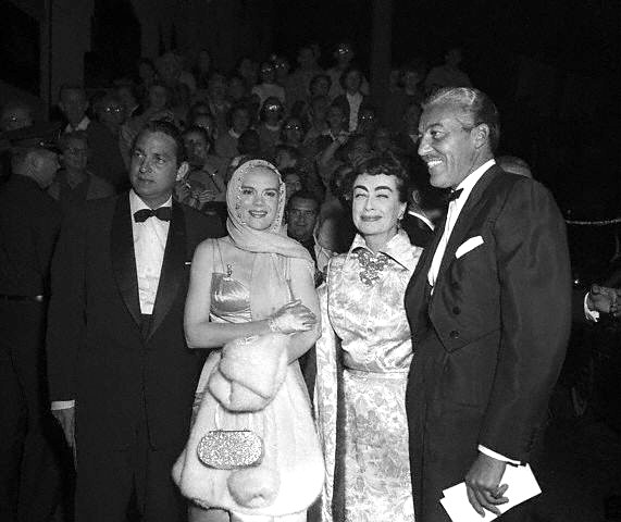 1954 'Star is Born' premiere, with unknown man, Marie Wilson, and Cesar Romero.