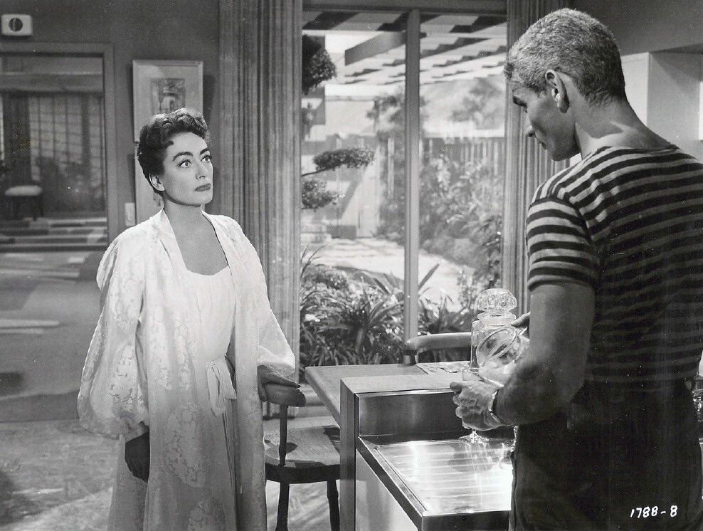 1955. 'Female on the Beach.' With Jeff Chandler. (Thanks to Stephen.)