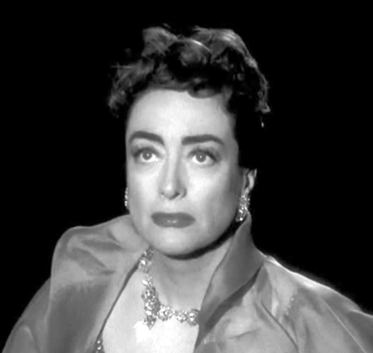 1955. 'Female on the Beach' screen shot.