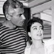 1955. On the set of 'Female on the Beach' with Jeff Chandler.