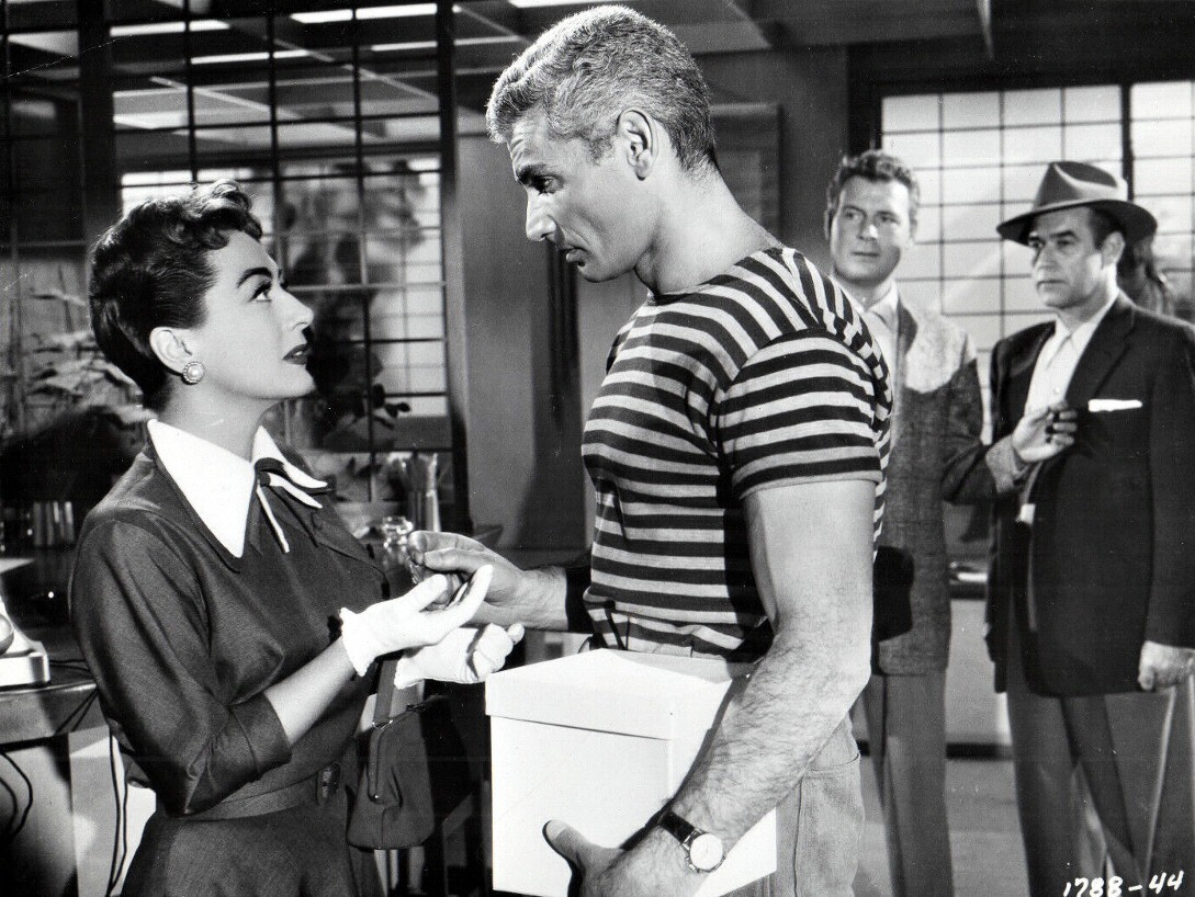 1955. 'Female on the Beach.' With Jeff Chandler.