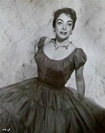 1955. 'Female on the Beach' publicity.