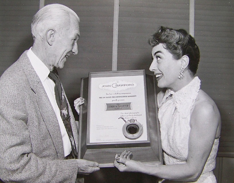 1955. Receiving the Golden Shutter Award from the LA Press Photographers Assoc.