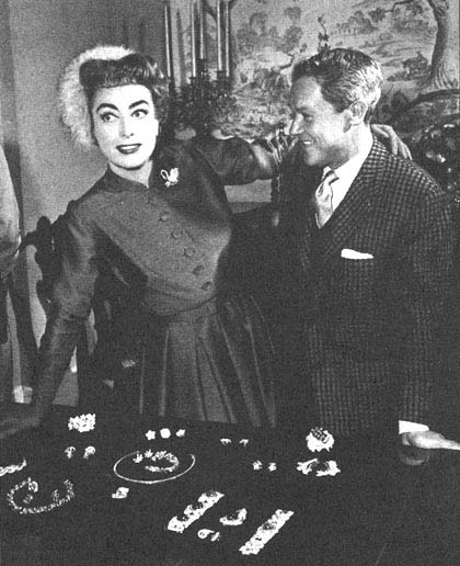 May 2, 1955.  On the set of 'Queen Bee' with famed designer Jean Louis.