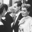 October 29, 1956. Being presented to the Queen at the Empire Theatre.