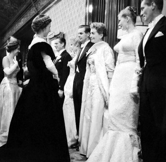 October 29, 1956. Being presented to Queen Elizabeth II at the Royal Film Performance.