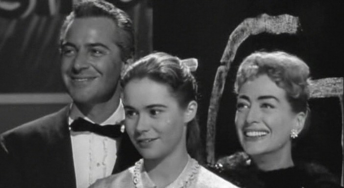 1957. 'The Story of Esther Costello' screen shot with Rossano Brazzi and Heather Sears.