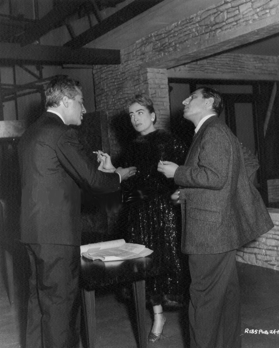 1957. On the set of 'Esther Costello' with Rossano Brazzi and director David Miller.