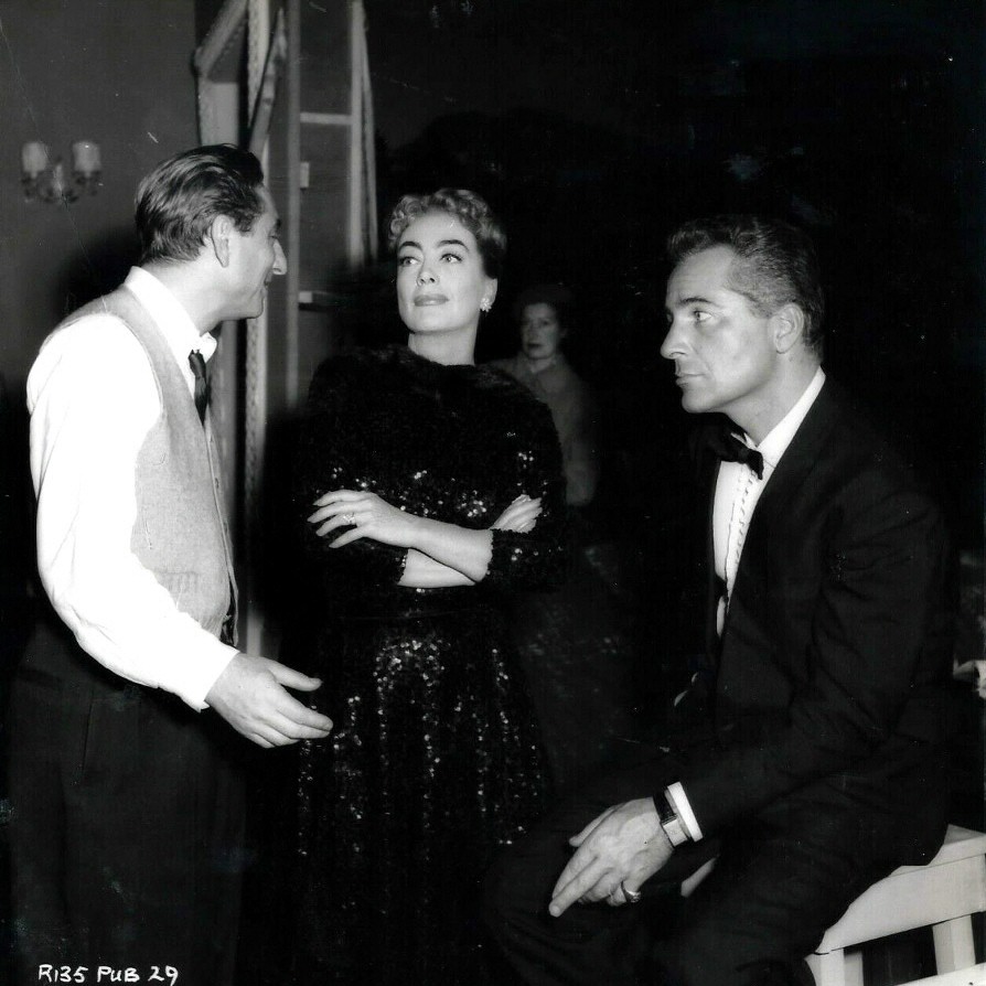 1957. On the set of 'Esther Costello' with director Miller (left) and co-star Brazzi.