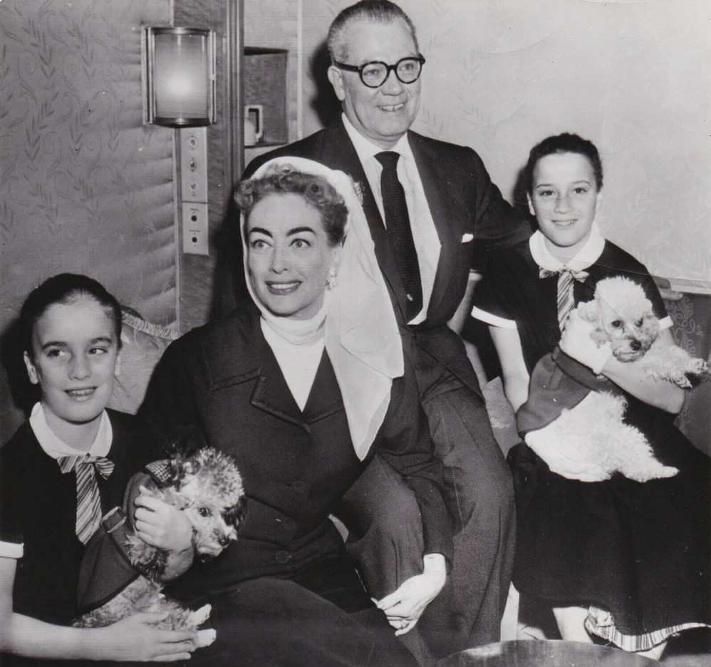 January 1957. Arriving in NY from England after filming. With husband Al Steele and twins Cathy and Cindy.