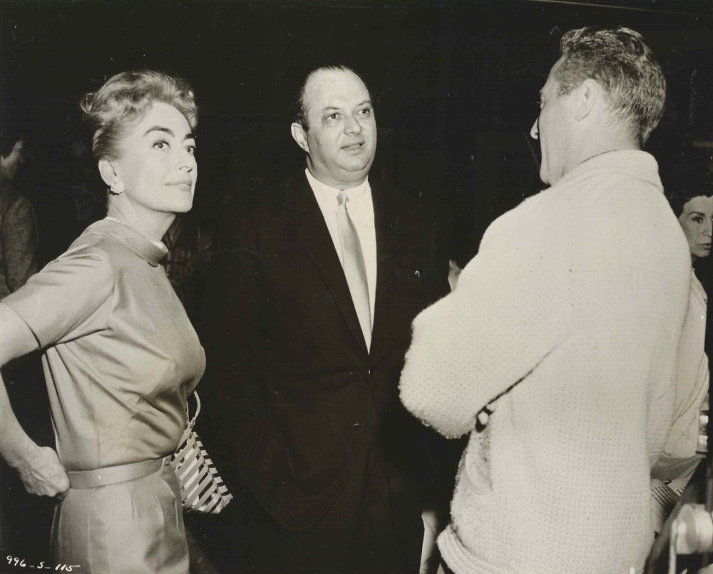 1959. On the set of 'The Best of Everything' with producer Jerry Wald (center).