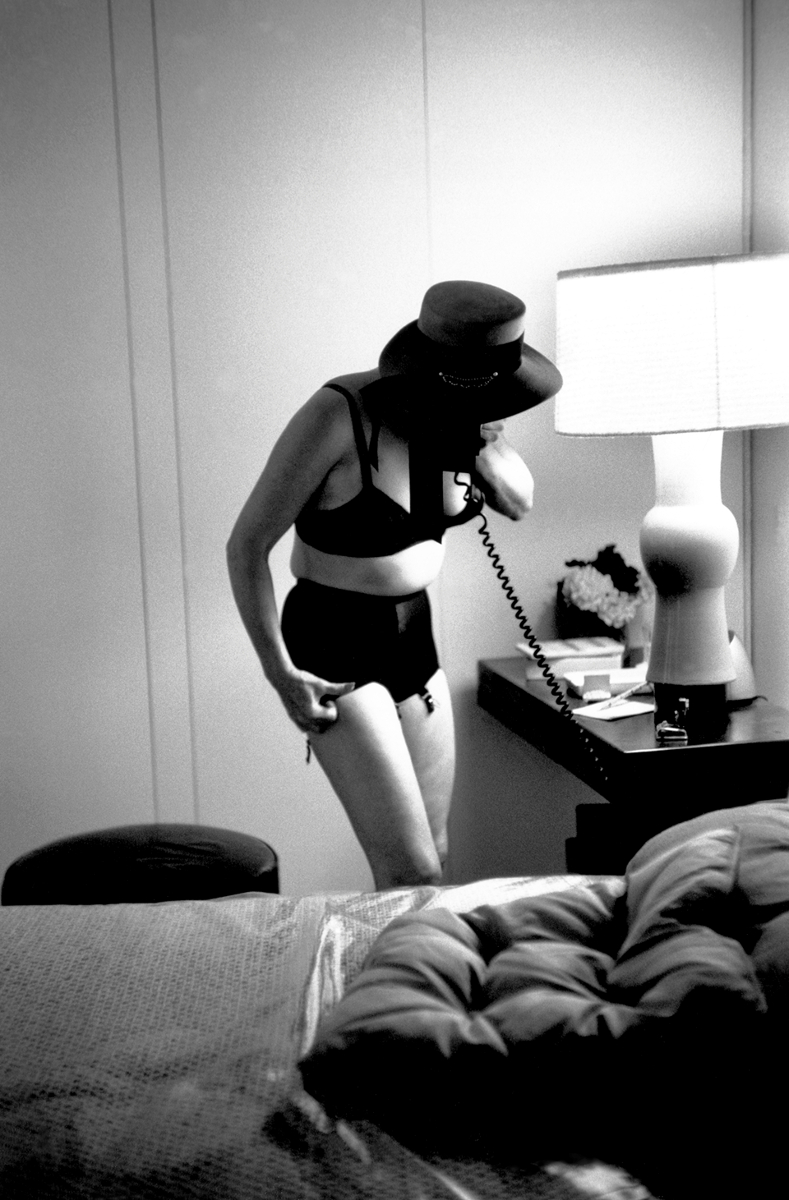 1959 shot by Eve Arnold. Joan on the phone to her agent.