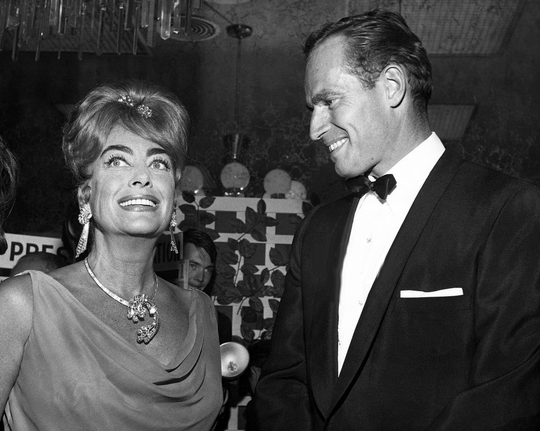 July 1962. At the Golden Globes banquet at the Beverly Hilton, with Charlton Heston.